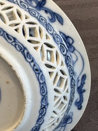 A Chinese blue and white reticulated double-walled cup and saucer, lingzhi mark, Kangxi