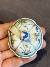 A Chinese famille verte 'flower and butterfly' teapot with an upright handle, Kangxi