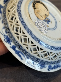 A Chinese blue and white reticulated double-walled cup and saucer, lingzhi mark, Kangxi
