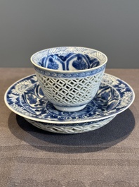 A Chinese blue and white reticulated double-walled cup and saucer, lingzhi mark, Kangxi