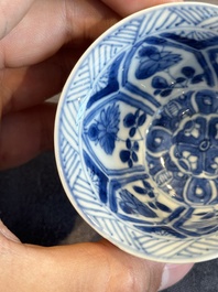 A Chinese blue and white reticulated double-walled cup and saucer, lingzhi mark, Kangxi