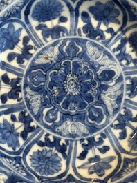 A Chinese blue and white reticulated double-walled cup and saucer, lingzhi mark, Kangxi