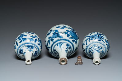 Three Japanese blue and white Arita 'birds among flowering branches' pharmacy bottles, Edo, 18th C.
