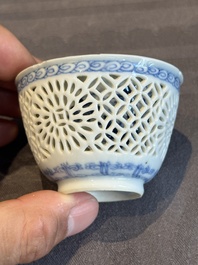 A Chinese blue and white reticulated double-walled cup and saucer, lingzhi mark, Kangxi