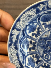 A Chinese blue and white reticulated double-walled cup and saucer, lingzhi mark, Kangxi