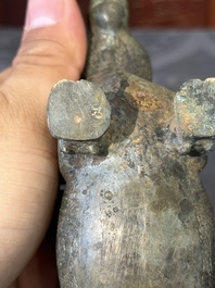 A rare Chinese bronze ritual vessel in the form of a tapir in Eastern Zhou-style, Warring States period