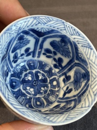 A Chinese blue and white reticulated double-walled cup and saucer, lingzhi mark, Kangxi