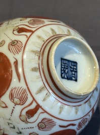 A Chinese iron-red, blue and white 'kinrande' bowl for the Japanese market, Ming