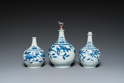 Three Japanese blue and white Arita 'birds among flowering branches' pharmacy bottles, Edo, 18th C.