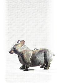 A rare Chinese bronze ritual vessel in the form of a tapir in Eastern Zhou-style, Warring States period