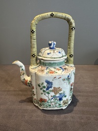 A Chinese famille verte 'flower and butterfly' teapot with an upright handle, Kangxi