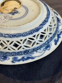 A Chinese blue and white reticulated double-walled cup and saucer, lingzhi mark, Kangxi