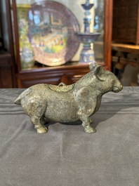 A rare Chinese bronze ritual vessel in the form of a tapir in Eastern Zhou-style, Warring States period