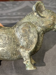 A rare Chinese bronze ritual vessel in the form of a tapir in Eastern Zhou-style, Warring States period