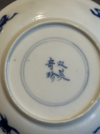 Two Chinese blue and white cups and three saucers with figural design, Kangxi and later