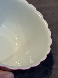 A pair of Chinese ruby-glazed bowls, Qianlong mark, 19/20th C.