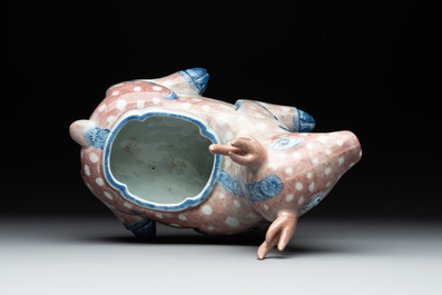 A pair of Chinese blue, white and copper-red stag-shaped jardini&egrave;res, 19th C.