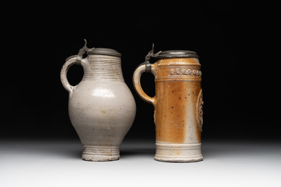 Two stoneware jugs with pewter lids, one with a coat of arms and dated 1636, Germany, 17th C.
