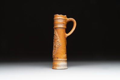 A Raeren stoneware 'Schnelle' with the coat of arms of the Holy Roman Emperor Rudolph II, dated 1583