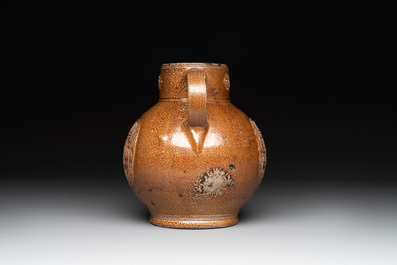 A globular stoneware jug with three coat of arms medallions, Germany, 16th C.