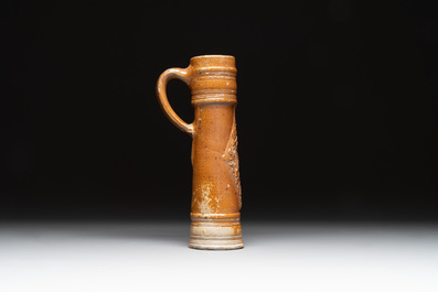 A Raeren stoneware 'Schnelle' with the coat of arms of the Holy Roman Emperor Rudolph II, dated 1583