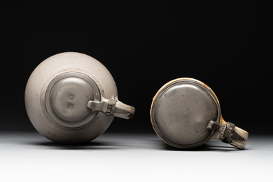 Two stoneware jugs with pewter lids, one with a coat of arms and dated 1636, Germany, 17th C.