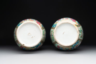 A pair of Chinese Canton famille rose celadon-ground 'court scene' vases, 19th C.
