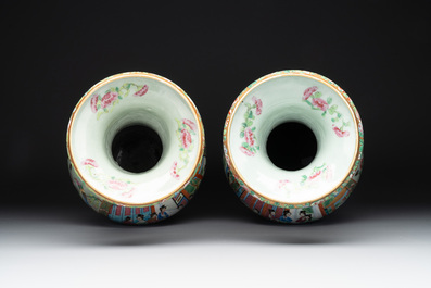 A pair of Chinese Canton famille rose celadon-ground 'court scene' vases, 19th C.