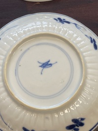 15 Chinese blue and white cups and 19 saucers, Kangxi/Yongzheng