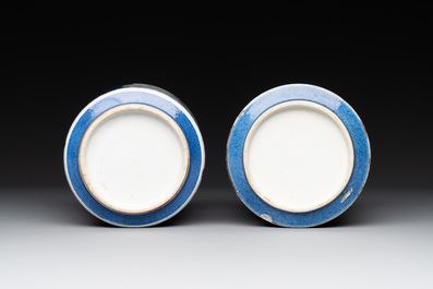 A pair of Chinese powder blue-ground famille verte vessels with a bird in a garden, Kangxi