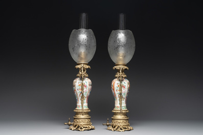 Two Chinese Canton famille rose vases mounted as lamps, a pair of vases and a bronze-mounted bowl, 19th C.