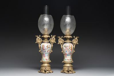 Two Chinese Canton famille rose vases mounted as lamps, a pair of vases and a bronze-mounted bowl, 19th C.