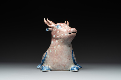 A pair of Chinese blue, white and copper-red stag-shaped jardini&egrave;res, 19th C.