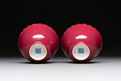 A pair of Chinese ruby-glazed bowls, Qianlong mark, 19/20th C.
