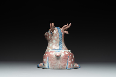 A pair of Chinese blue, white and copper-red stag-shaped jardini&egrave;res, 19th C.