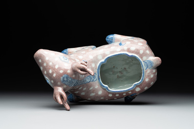 A pair of Chinese blue, white and copper-red stag-shaped jardini&egrave;res, 19th C.