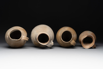 A collection of 8 German proto stoneware ribbed jugs, including 'Jacobakans', 14th C.