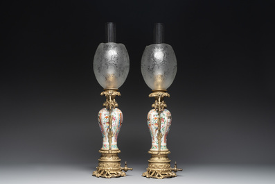 Two Chinese Canton famille rose vases mounted as lamps, a pair of vases and a bronze-mounted bowl, 19th C.
