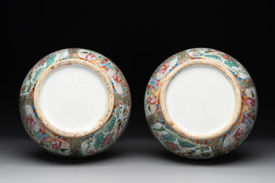 A pair of Chinese Canton famille rose vases with narrative design, 19th C.