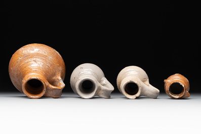 14 German stoneware jugs, mugs and vessels, 14/16th C.