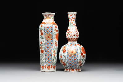 Two polychrome Dutch Delft petit feu vases with floral design, early 18th C.