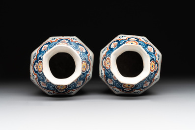 A pair of polychrome Dutch Delft octagonal chinoiserie vases, 18th C.