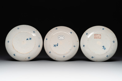 Seven Dutch Delft polychrome 'flower basket' plates, 18th C.