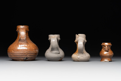 14 German stoneware jugs, mugs and vessels, 14/16th C.