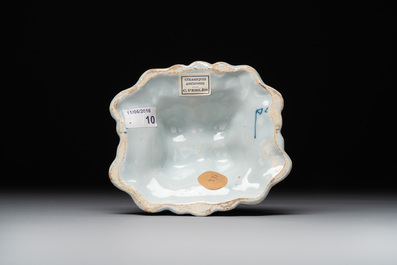 A Dutch Delft blue and white candle holder, 18th C.