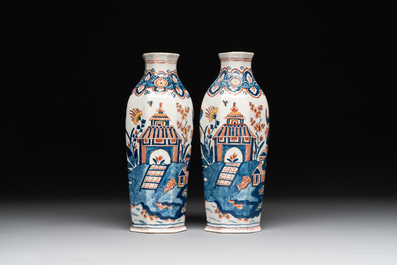 A pair of polychrome Dutch Delft octagonal chinoiserie vases, 18th C.