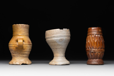 14 German stoneware jugs, mugs and vessels, 14/16th C.