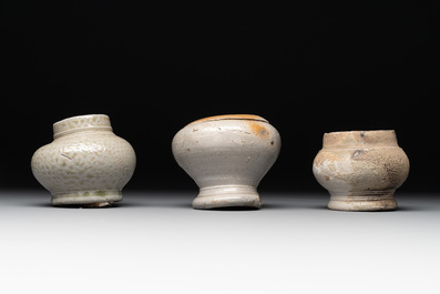 14 German stoneware jugs, mugs and vessels, 14/16th C.
