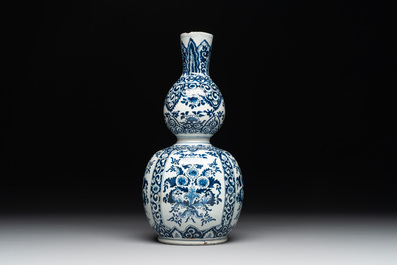 A Dutch Delft blue and white double gourd vase, Pieter Kam, ca. 1700