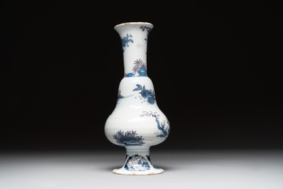 A Dutch Delft blue, white and manganese pear-shaped chinoiserie vase, late 17th C.